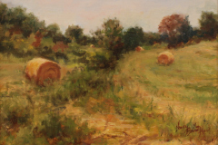 Nancy Bauer Howell, "Italian Hay Balls", oil, $450.  AWARD OF MERIT Juror comment: "Beautiful landscape with a great design, following the hay bales back along the path. The harmony is so soft and believable with great variety in the greens. I love the way she paid attention to the grasses on the right, the direction of brushstrokes." - Kathy Anderson