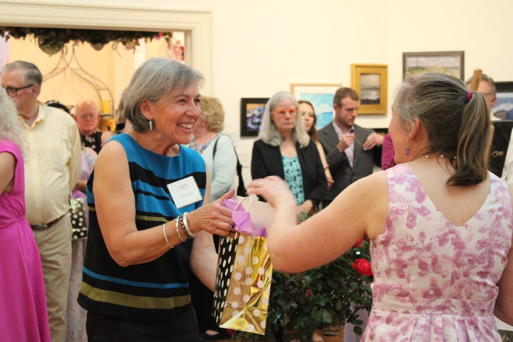 Happily Receiving Her Prize