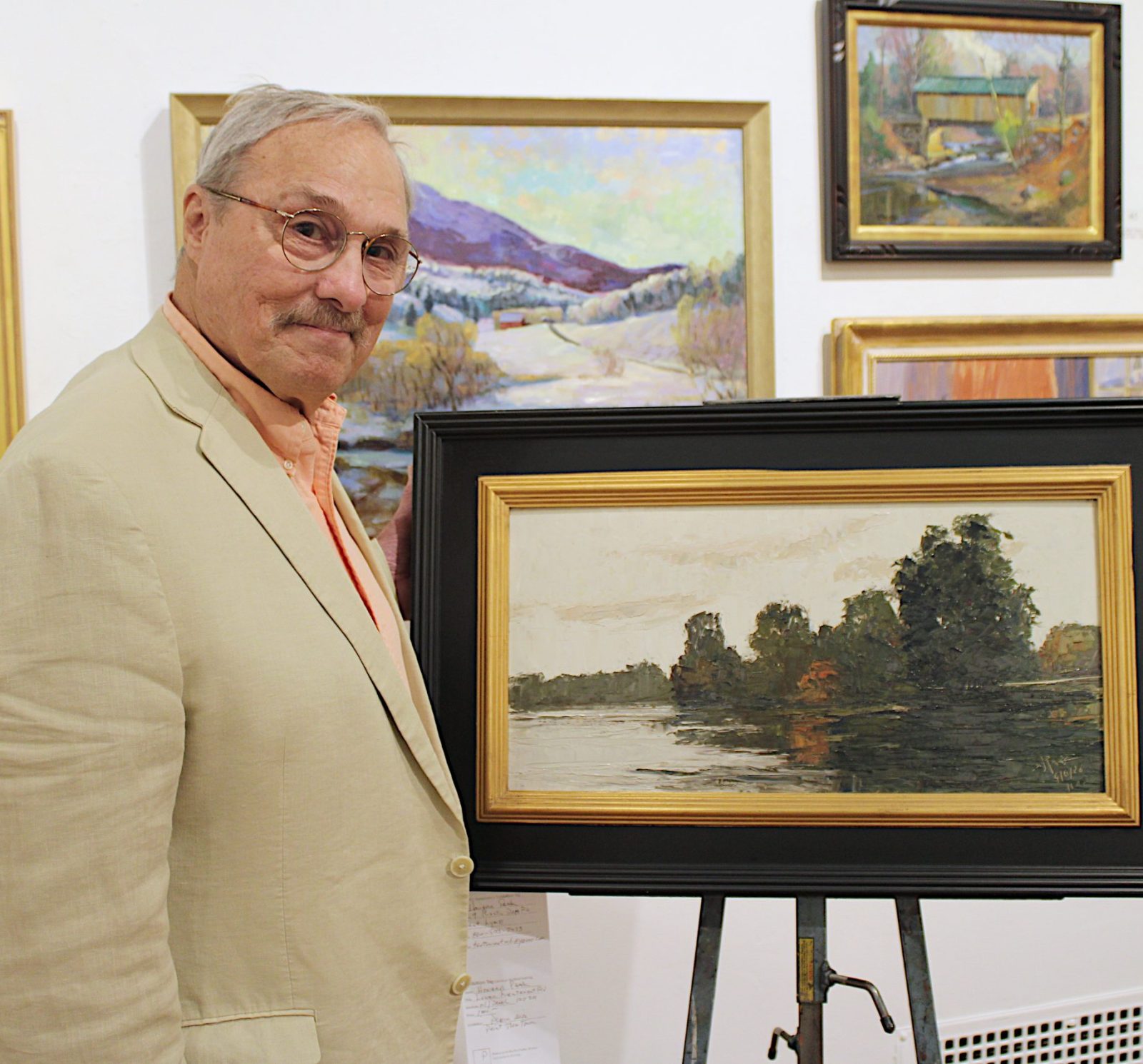 Howard Park and his plein air piece at Paint the Town 2025
